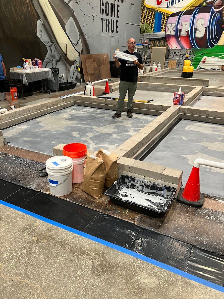 South Coast Epoxy installing decorative concrete coatings at a Texas commercial venue