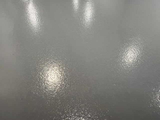 Copper-toned metallic epoxy surface